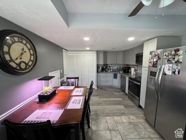 5981 S Sultan Cir, Murray, UT 84107 - kitchen featuring stainless steel appliances, recessed lighting, light countertops, ceiling fan, and gray cabinetry