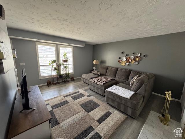 5981 S Sultan Cir, Murray, UT 84107 - living room with a textured ceiling and wood finished floors