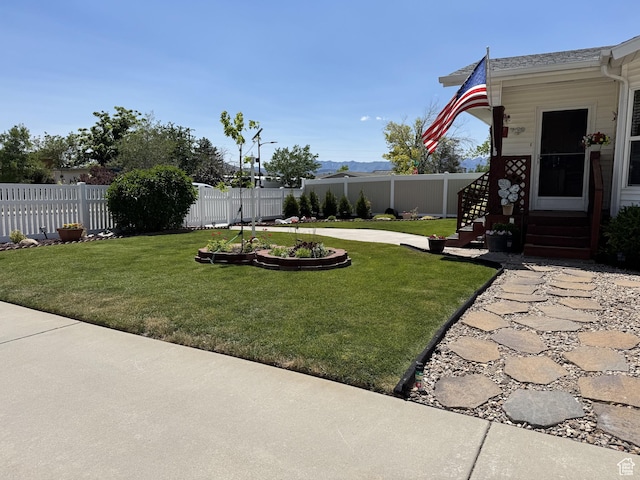 804 Fleetwood Dr, Tooele, UT 84074 - fenced backyard with a patio area