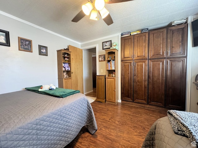 804 Fleetwood Dr, Tooele, UT 84074 - bedroom with dark wood finished floors, crown molding, and a ceiling fan