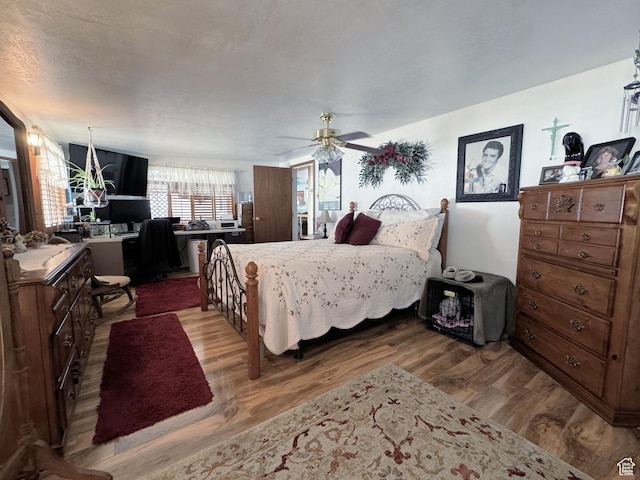 804 Fleetwood Dr, Tooele, UT 84074 - bedroom featuring wood finished floors and ceiling fan