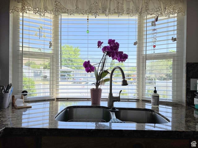 804 Fleetwood Dr, Tooele, UT 84074 - kitchen view of a sink and stone counters