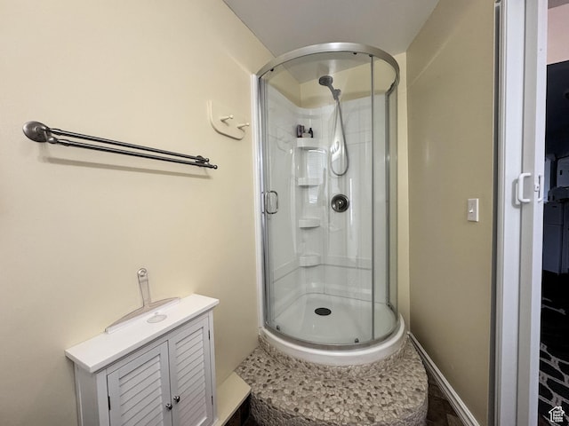 804 Fleetwood Dr, Tooele, UT 84074 - full bath with a shower stall and baseboards