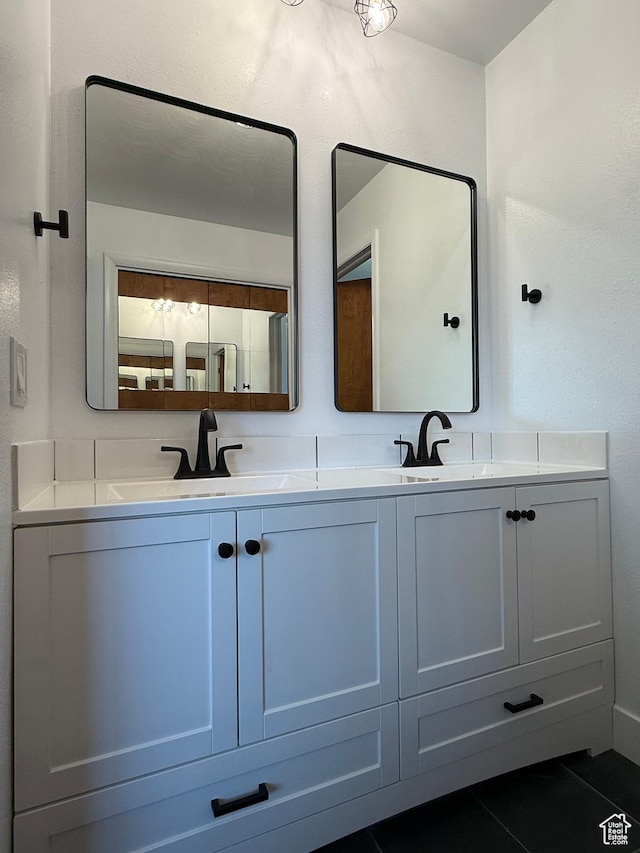262 N 400 E, Fairview, UT 84629 - bathroom featuring double vanity and tile patterned floors
