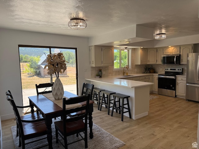 262 N 400 E, Fairview, UT 84629 - dining area with a chandelier and light wood-style floors