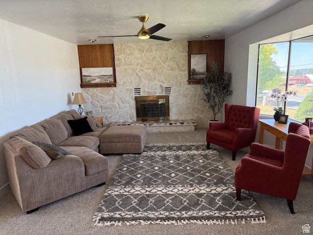 262 N 400 E, Fairview, UT 84629 - living area featuring carpet, ceiling fan, a fireplace, and a textured ceiling