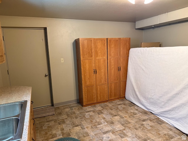 262 N 400 E, Fairview, UT 84629 - unfurnished bedroom featuring stone finish flooring and a sink