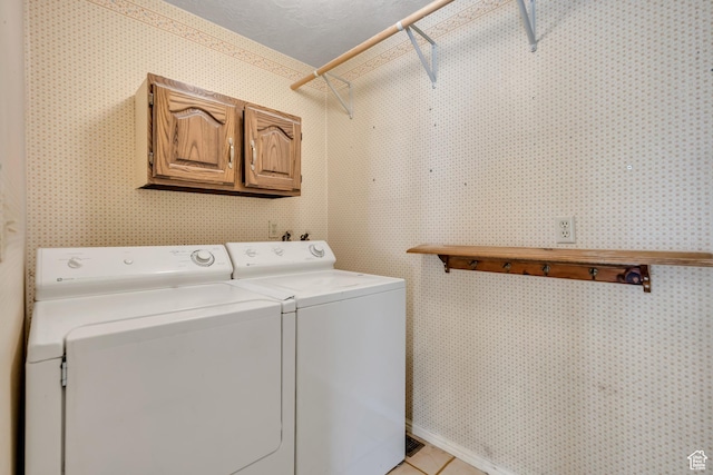1936 S 800 E, Bountiful, UT 84010 - laundry room featuring separate washer and dryer, cabinet space, wallpapered walls, and light tile patterned flooring