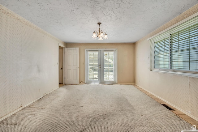 1936 S 800 E, Bountiful, UT 84010 - carpeted empty room with a chandelier, a textured ceiling, french doors, and ornamental molding