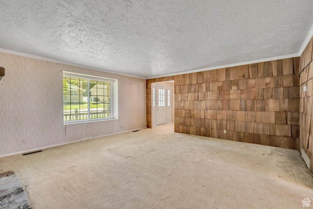 1936 S 800 E, Bountiful, UT 84010 - carpeted empty room with crown molding, a textured ceiling, and wooden walls