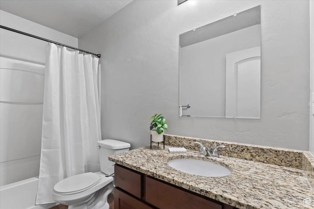 491 S Freedom Blvd Unit 104204, Provo, UT 84601 - bathroom with vanity, shower / bath combo with shower curtain, and a textured wall
