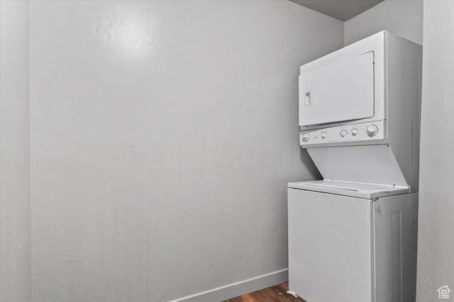 491 S Freedom Blvd Unit 104204, Provo, UT 84601 - laundry area featuring estacked washer and dryer and dark wood-style flooring