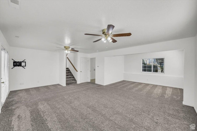 971 N 600 E, Springville, UT 84663 - unfurnished living room with carpet, ceiling fan, and stairway