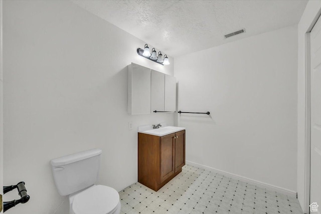 971 N 600 E, Springville, UT 84663 - bathroom featuring tile patterned floors, vanity, and a textured ceiling
