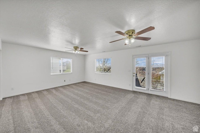 971 N 600 E, Springville, UT 84663 - empty room featuring ceiling fan, plenty of natural light, a textured ceiling, and carpet