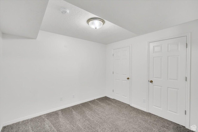 971 N 600 E, Springville, UT 84663 - unfurnished bedroom featuring dark colored carpet and a textured ceiling