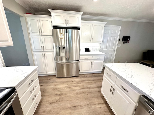 2442 N 2275 E, Layton, UT 84040 - kitchen featuring stainless steel fridge, electric stove, light wood-type flooring, white cabinetry, and ornamental molding