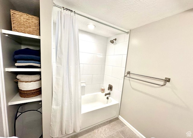 2442 N 2275 E, Layton, UT 84040 - bathroom with shower / bath combo with shower curtain, a textured ceiling, and tile patterned floors