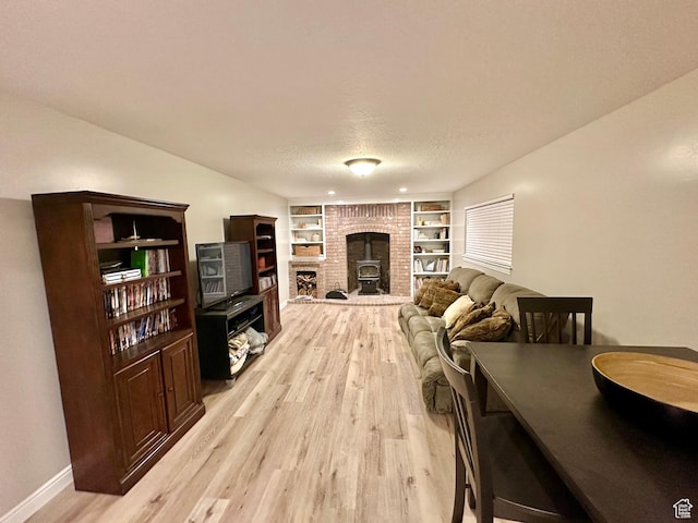 2442 N 2275 E, Layton, UT 84040 - living area featuring light wood-style flooring and built in features