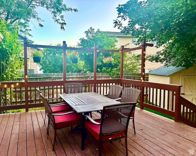 2442 N 2275 E, Layton, UT 84040 - wooden terrace with a fenced backyard and outdoor dining area
