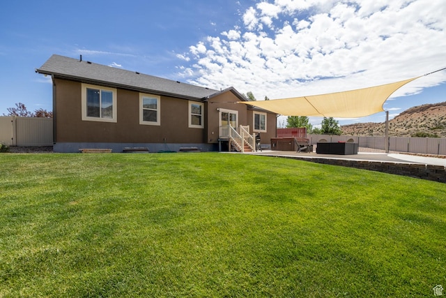 3486 W 1750 S, Vernal, UT 84078 - rear view of house featuring a fenced backyard, a patio, entry steps, and stucco siding
