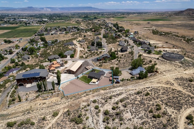 3486 W 1750 S, Vernal, UT 84078 - aerial view of sparsely populated area with property parcel outlined and a mountain backdrop