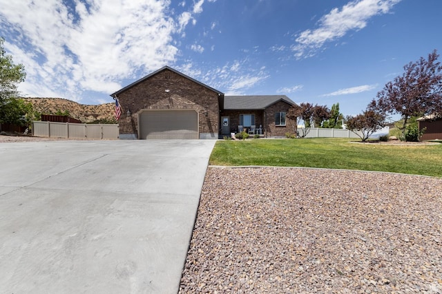 3486 W 1750 S, Vernal, UT 84078 - ranch-style home with brick siding, concrete driveway, and a garage