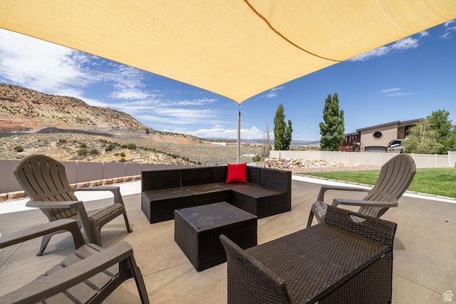 3486 W 1750 S, Vernal, UT 84078 - fenced backyard with a patio, a mountain view, and outdoor lounge area