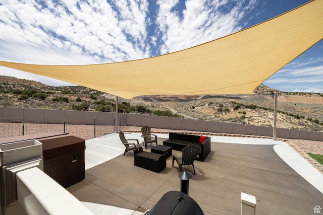 3486 W 1750 S, Vernal, UT 84078 - fenced backyard featuring a mountain view, a patio, and outdoor lounge area