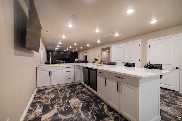 3486 W 1750 S, Vernal, UT 84078 - kitchen featuring recessed lighting, dark marble finish floors, and light stone counters