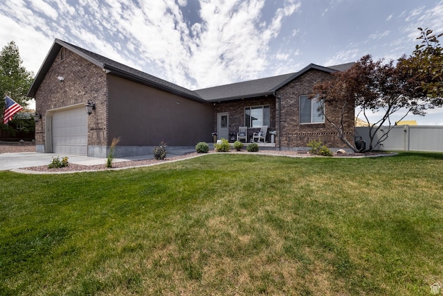 3486 W 1750 S, Vernal, UT 84078 - ranch-style home featuring brick siding, a garage, and driveway