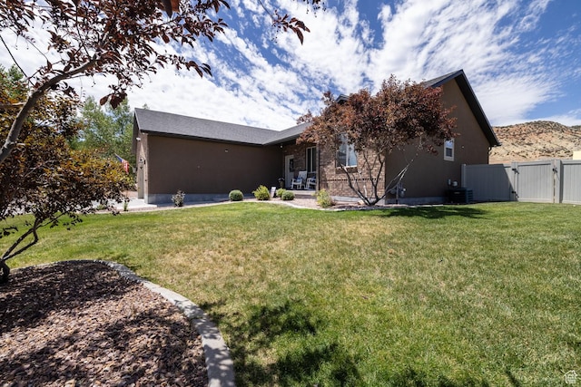 3486 W 1750 S, Vernal, UT 84078 - back of house featuring a gate and stucco siding