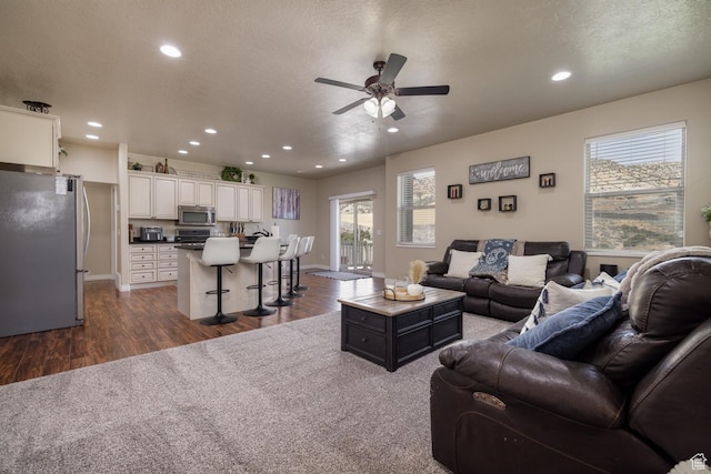 3486 W 1750 S, Vernal, UT 84078 - living room with dark wood-style floors, a ceiling fan, and recessed lighting
