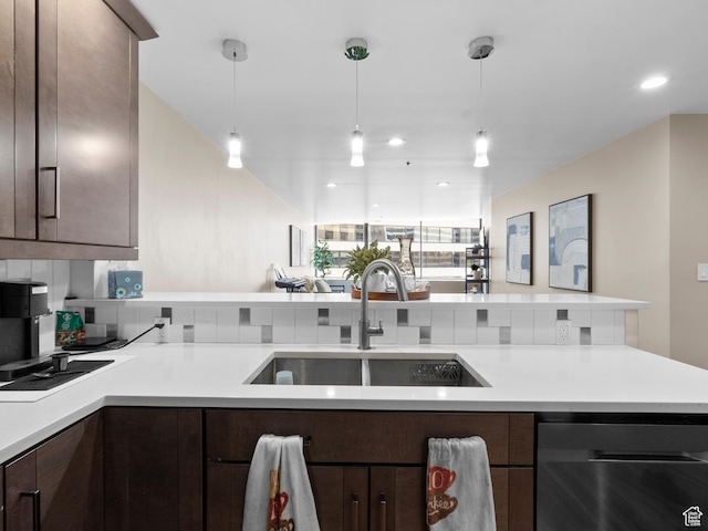 48 W 300 S Unit 1203N, Salt Lake City, UT 84101 - kitchen featuring dishwashing machine, dark brown cabinetry, light countertops, pendant lighting, and recessed lighting