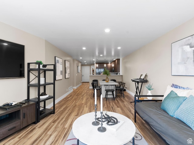 48 W 300 S Unit 1203N, Salt Lake City, UT 84101 - living room with light wood finished floors and recessed lighting