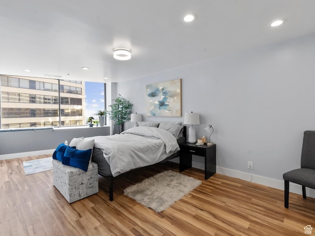 48 W 300 S Unit 1203N, Salt Lake City, UT 84101 - bedroom with wood finished floors and recessed lighting