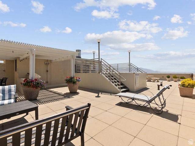 48 W 300 S Unit 1203N, Salt Lake City, UT 84101 - view of patio with a pergola and a mountain view