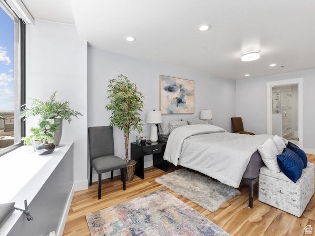 48 W 300 S Unit 1203N, Salt Lake City, UT 84101 - bedroom featuring light wood-type flooring, recessed lighting, and ensuite bathroom