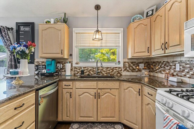 4266 S 2900 W, Roy, UT 84067 - kitchen with white appliances, light brown cabinetry, decorative backsplash, and dark stone countertops