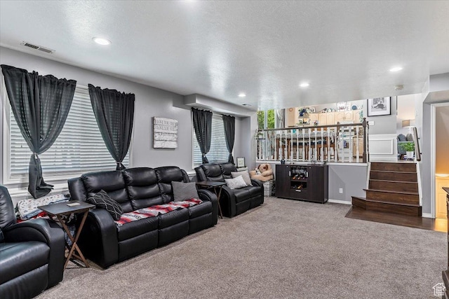 4266 S 2900 W, Roy, UT 84067 - living room with carpet, recessed lighting, a textured ceiling, stairs, and bar area