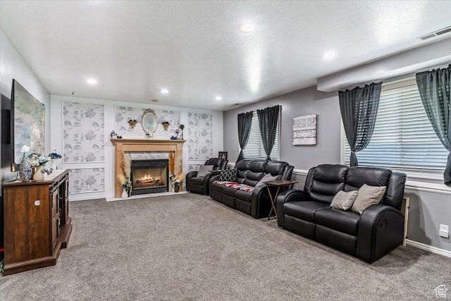 4266 S 2900 W, Roy, UT 84067 - living area featuring carpet flooring, a premium fireplace, a textured ceiling, and recessed lighting