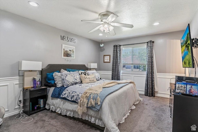 4266 S 2900 W, Roy, UT 84067 - carpeted bedroom with a wainscoted wall, a textured ceiling, a decorative wall, recessed lighting, and a ceiling fan