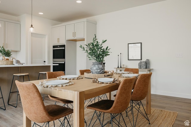 5976 N Canyon Rim Rd E Unit 615, Lehi, UT 84043 - dining room featuring light wood-type flooring and recessed lighting