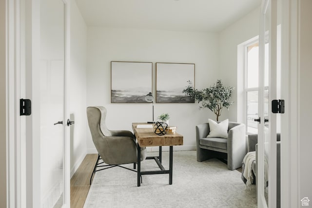5976 N Canyon Rim Rd E Unit 615, Lehi, UT 84043 - sitting room featuring a desk and wood finished floors