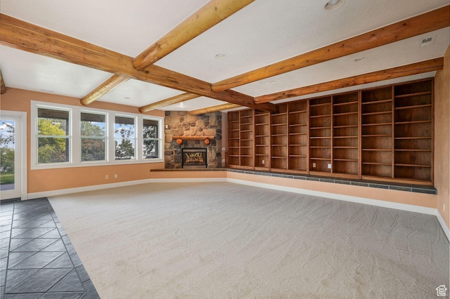 238 N Vista Ct, Saratoga Springs, UT 84045 - unfurnished living room featuring carpet flooring, beam ceiling, a stone fireplace, and built in features