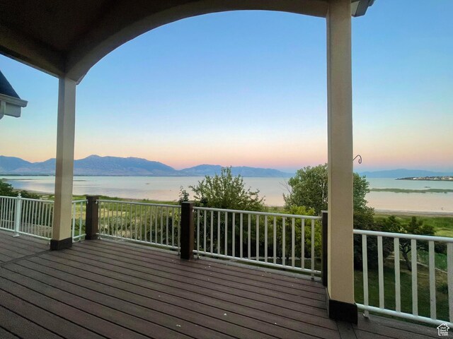 238 N Vista Ct, Saratoga Springs, UT 84045 - deck at dusk with a water and mountain view