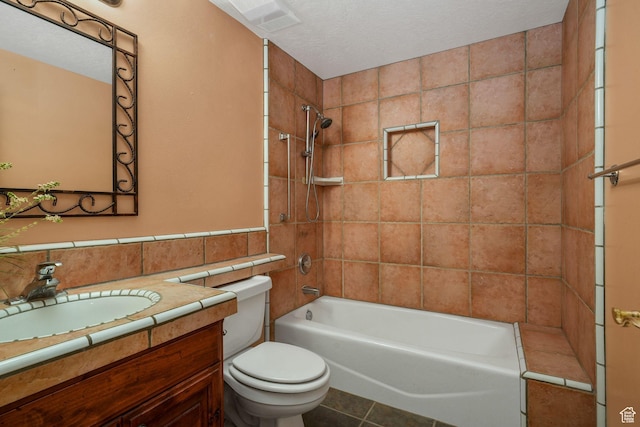 238 N Vista Ct, Saratoga Springs, UT 84045 - full bathroom featuring vanity, shower / tub combination, tile walls, tile patterned floors, and a textured ceiling