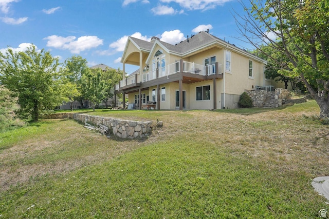 238 N Vista Ct, Saratoga Springs, UT 84045 - back of house with stucco siding and a yard