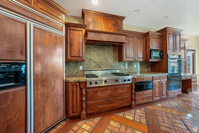 238 N Vista Ct, Saratoga Springs, UT 84045 - kitchen with black appliances, a warming drawer, tasteful backsplash, and custom exhaust hood