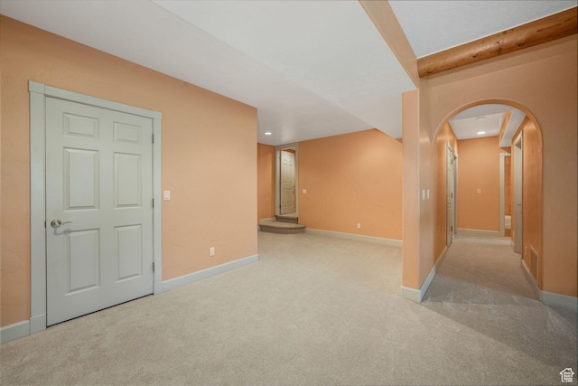 238 N Vista Ct, Saratoga Springs, UT 84045 - unfurnished room featuring arched walkways, carpet flooring, recessed lighting, and beam ceiling